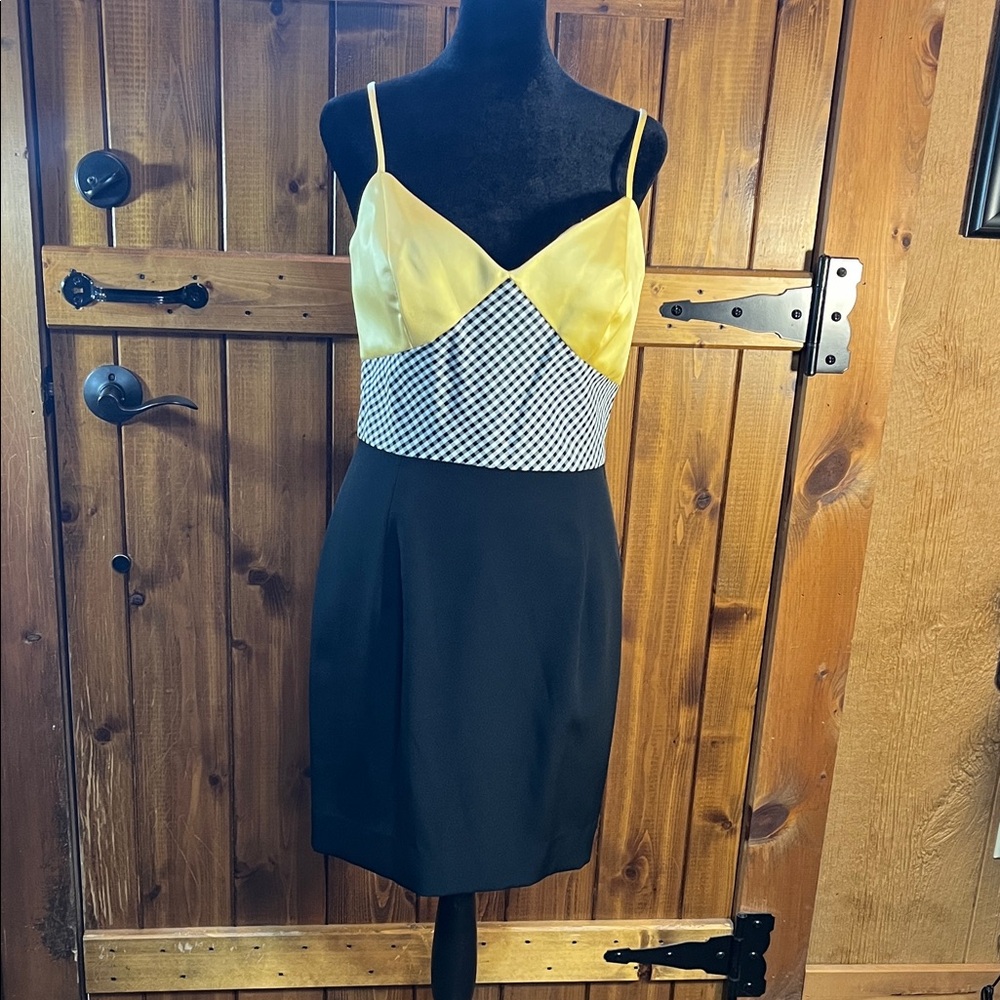 Vintage size 6 mini dress in vivid yellow with black and white checks.
